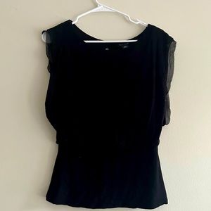 WHBM black sleeveless tank with elastic waist and frill on arm holes. size xs